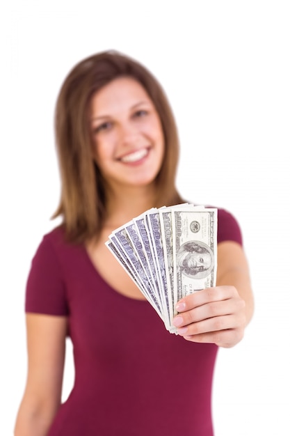 Photo festive brunette in dress showing her cash