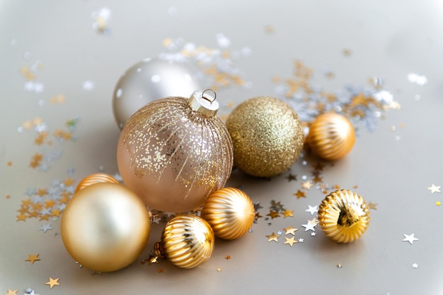 Festive christmas balls composition golden color