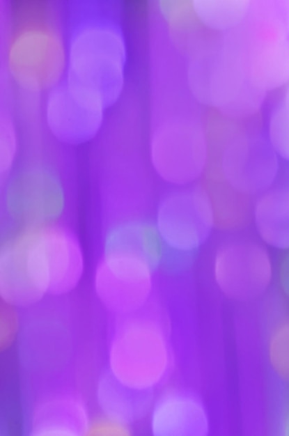 Festive Christmas elegant abstract background Defocused purple lights background Ultra violet glitter bokeh background