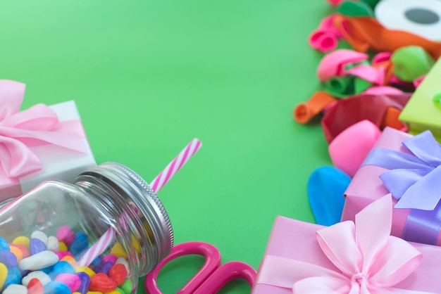 Festive composition set of gift boxes with balls candy cocktail materials.