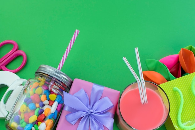 Festive composition set of gift boxes with balls candy cocktail materials.