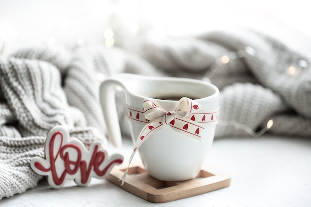 Festive composition with a cup and decor details for valentines day