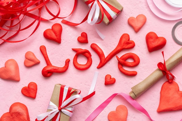 Festive concept for Valentine's day with gifts and hearts.