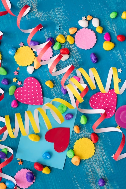 Festive confetti background heart candy color saturated.