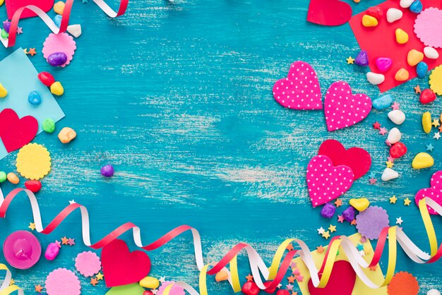 Festive confetti background heart candy color saturated.