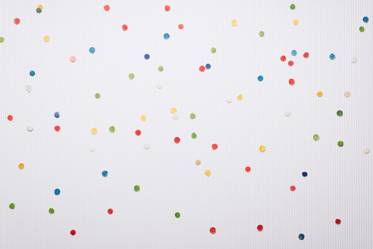 Festive confetti on a white background. Christmas and New Year background with copy space