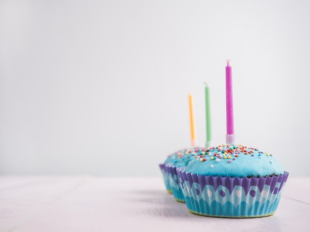 Festive cupcakes with candles