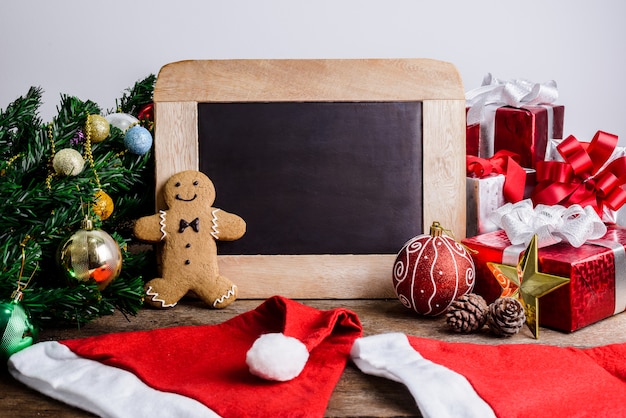 Festive Decoration, Christmas Cookie and New Year in the shape of Gingerbread man on wooden table