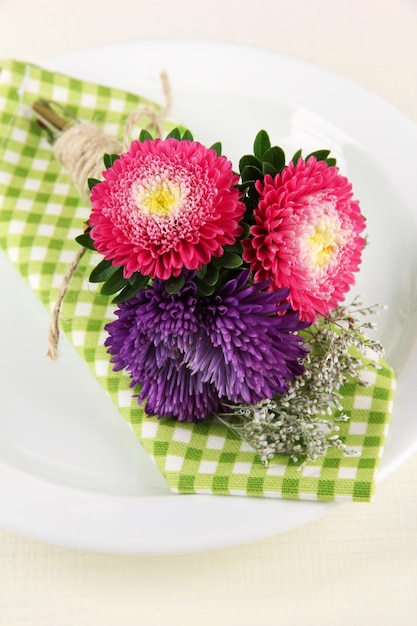 Festive dining table setting with flowers