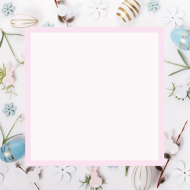 Photo festive easter border frame from easter eggs and spring flower crocus on blue background