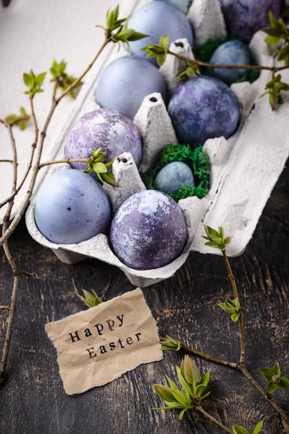 Festive easter eggs in purple and blue color