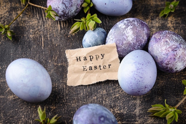 Festive easter eggs in purple and blue color