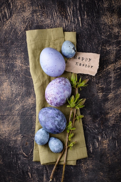 Festive easter eggs in purple and blue color