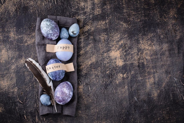 Festive easter eggs in purple and blue color