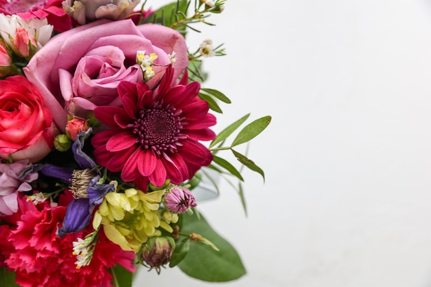 Festive floral bouquet of flowers on a white background The view from the top Background for greeting card invitation Soft focus