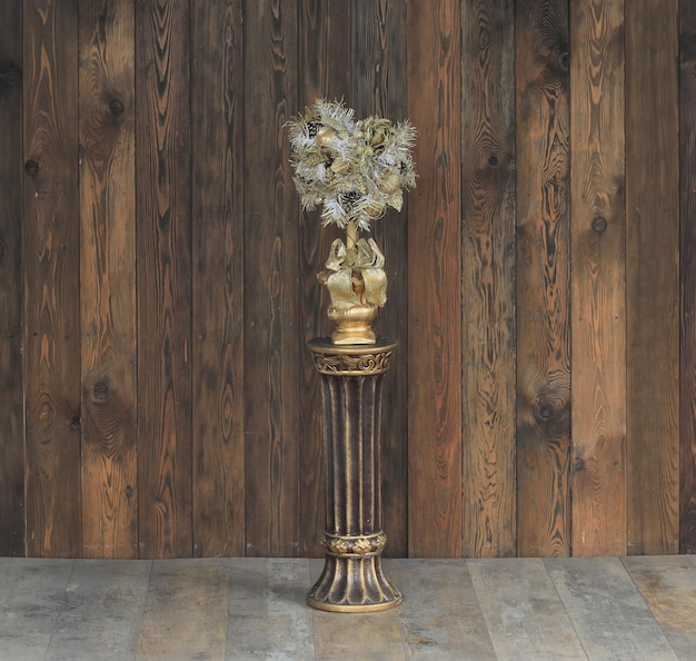 festive golden decorative bouquet on a stand