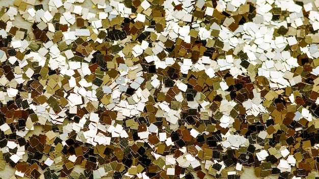 Festive golden sparkly sequin wallpaper