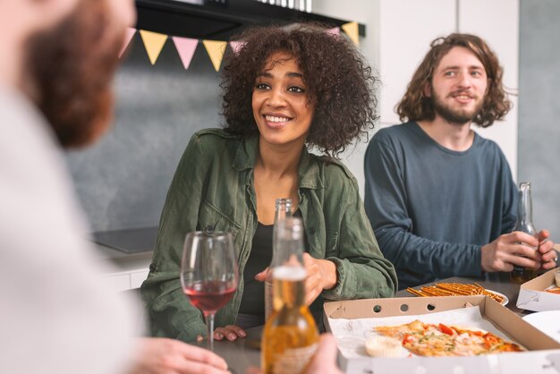 Festive party among multi-ethnic friends at home