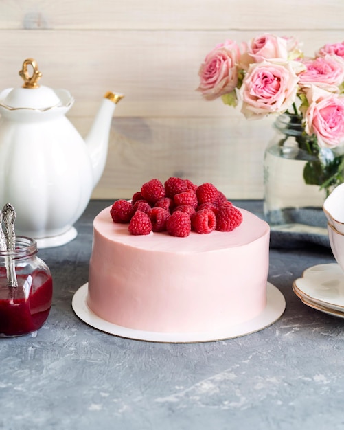 festive pink cake Raspberry cake for the party Pie and pink roses Birthday Tea party