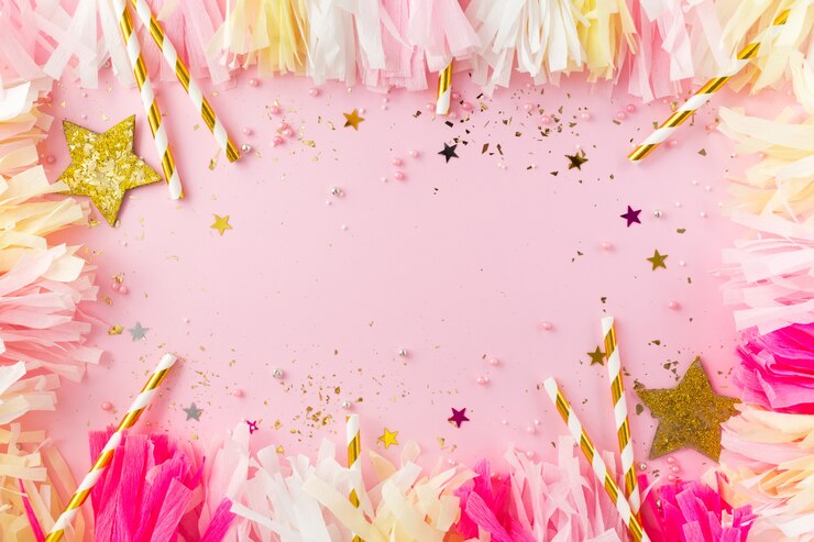 Photo festive pink wall with golden decorations.
