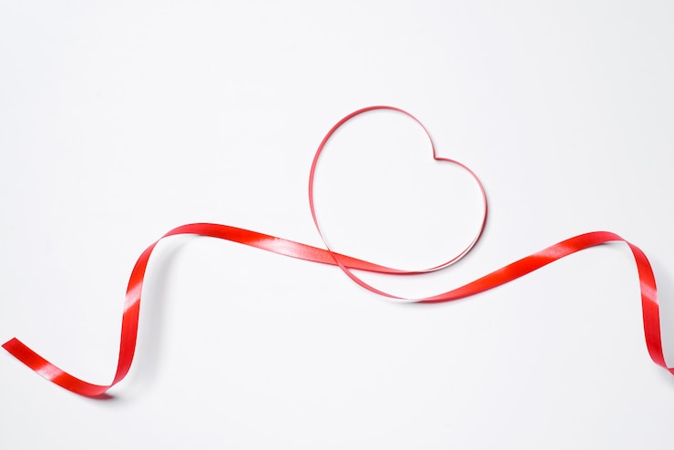 Photo festive red ribbon isolated on white background