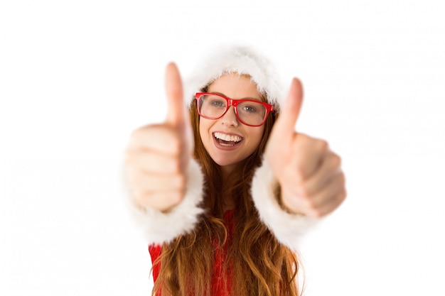 Festive redhead smiling at camera