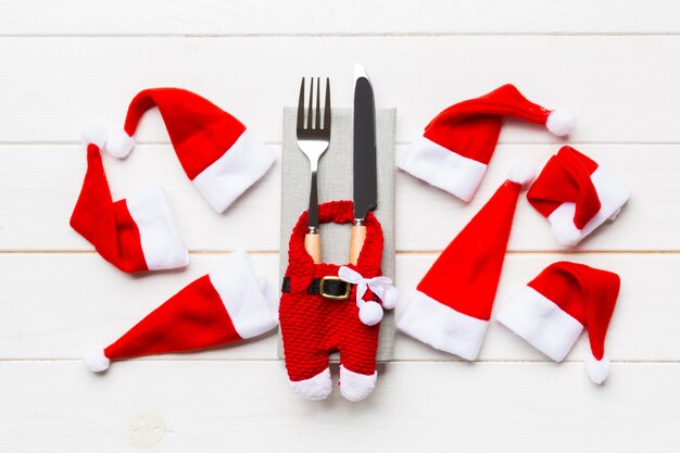 Festive set of fork and knife on wood