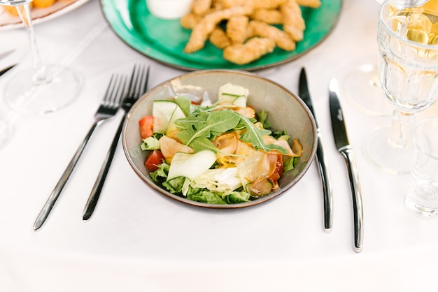 Festive table full of delicious food and snacks, beautiful serving, catering, vegetable salad