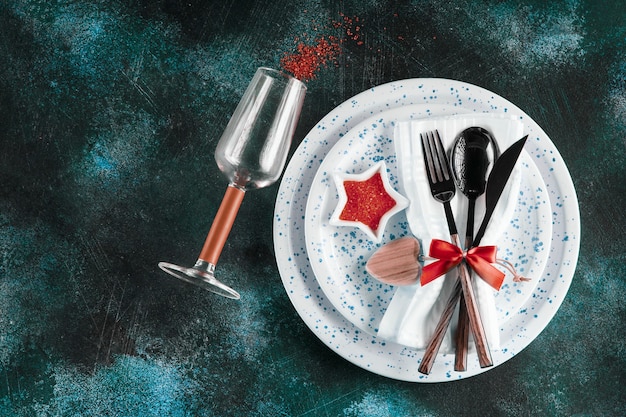 Festive table place setting for Christmas