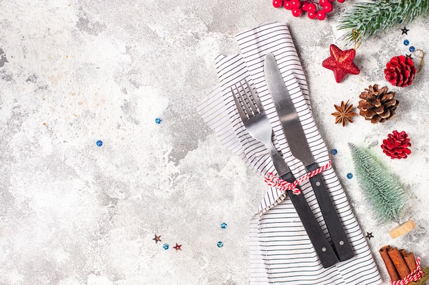 Festive table setting christmas cutlery fork knife new year meal on the table copy space food