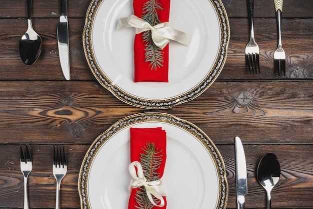 Festive table setting for christmas dinner top view
