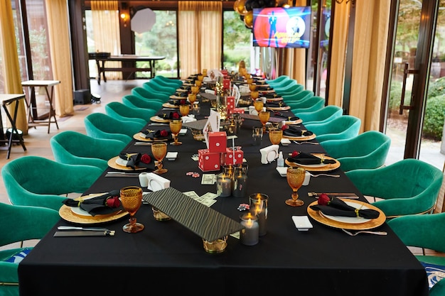 Festive table setting for events with cards and candles