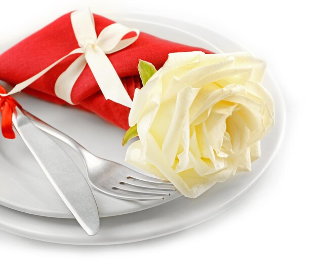 Festive table setting for valentines day isolated on white