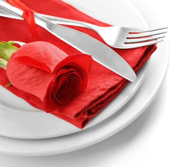 Festive table setting for Valentines Day isolated on white