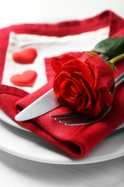 Festive table setting for Valentines Day on light background