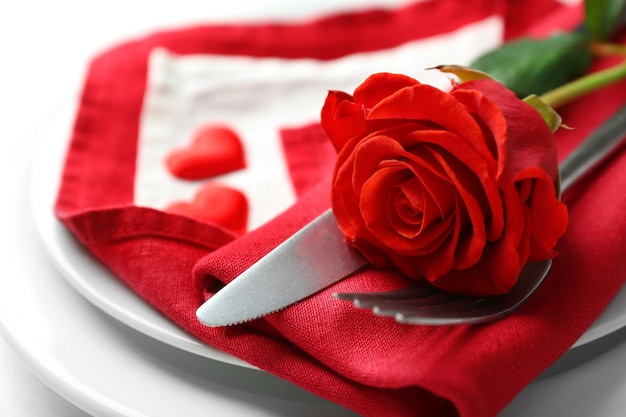 Festive table setting for Valentines Day on light background