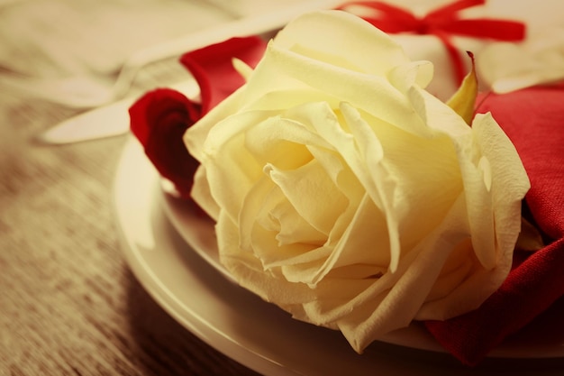 Festive table setting for Valentines Day on wooden background