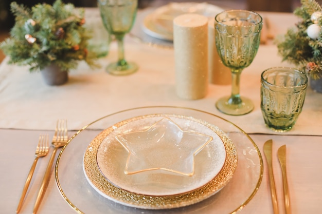 Festive table setting with decorations for Christmas and New Year