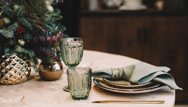 Festive table setting with decorations for Christmas and New Year