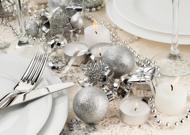 Festive table setting with silver cutlery