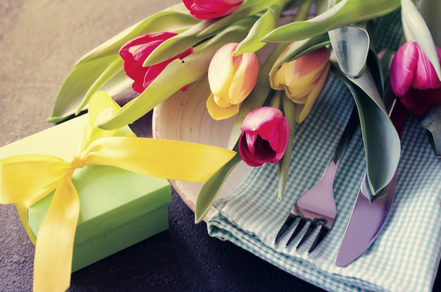 Festive table setting with tulips