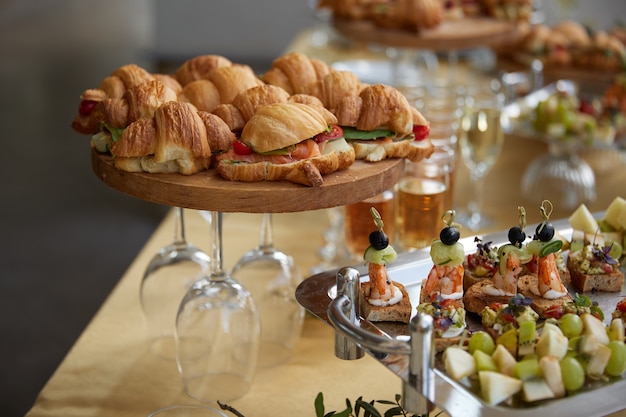 Festive table with sandwiches wine and hemp