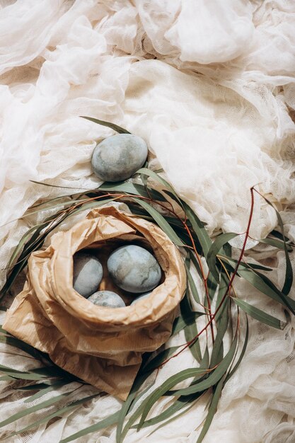 Festively decorated Easter eggs painted with natural blue headlights by soaking in tea hyacinth tea