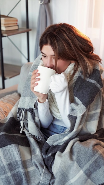 fever disease sick woman home recovery shivering