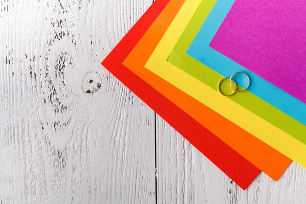 Few colored papers on wooden table