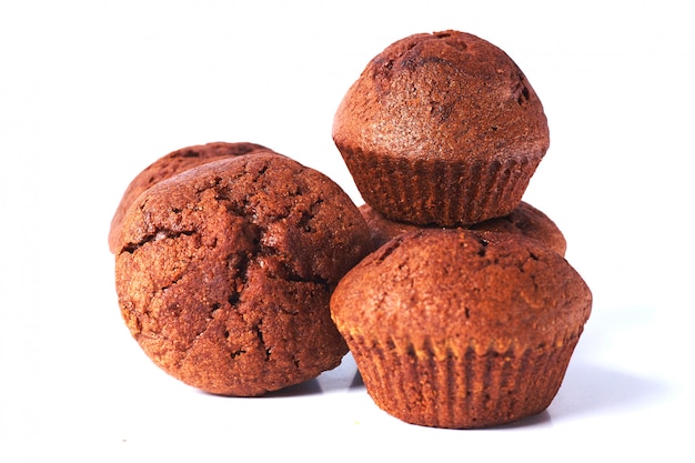 A few dark chocolate dough muffin on isolated on white background.