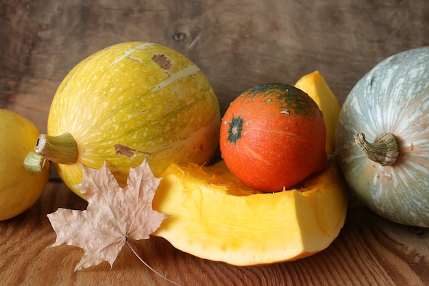 few pumpkin cutting harvest on wooden table