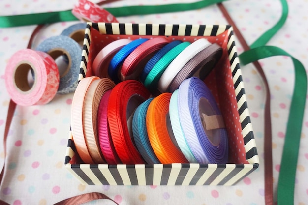 a few rolls of colorful ribbon for crafting, handmade items and DIY