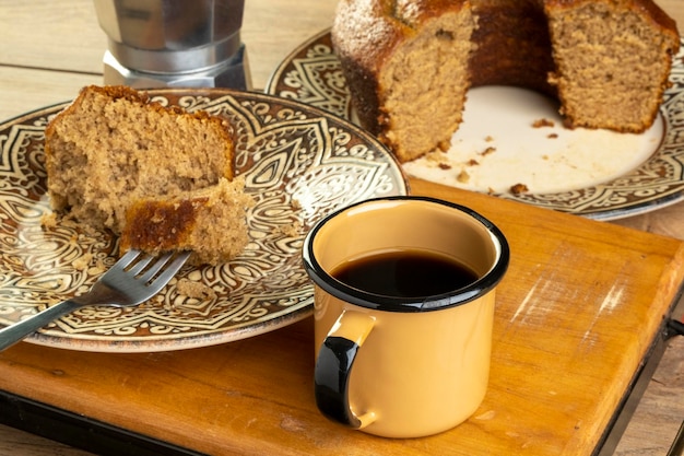 A few slices of banana cake with a cup of coffee.