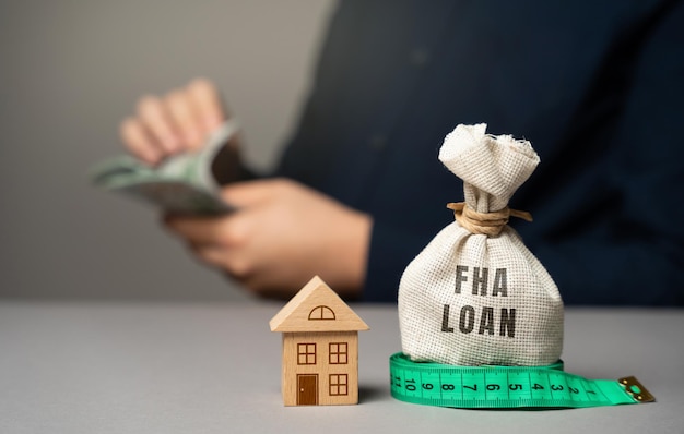 FHA loan concept Mortgage insured by Federal Housing Administration Loan Affordable loans for borrowers with a low credit score Down payment Purchase or refinance a primary residence